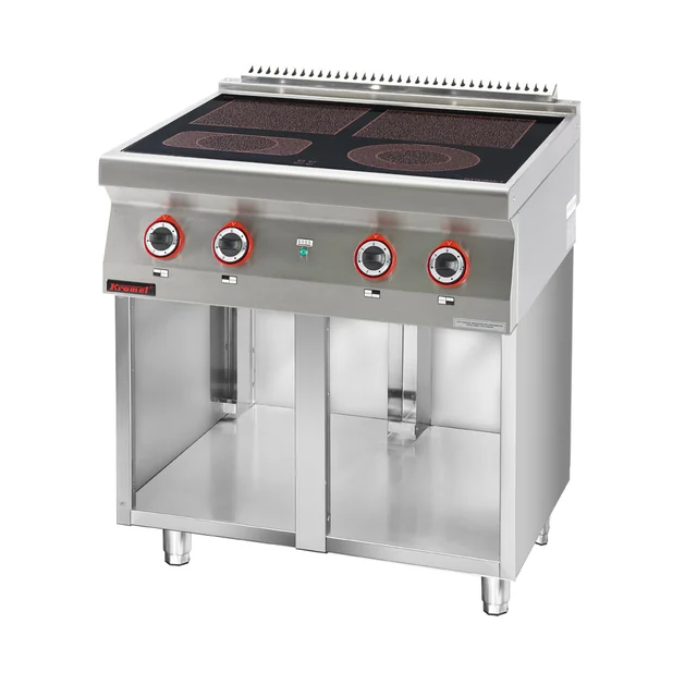 Cuisinière électrique vitrocéramique 4 du champ 2x4kW + 2x2,1kW sur fond de meuble ouvert