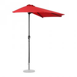 A standing garden umbrella, semicircular red