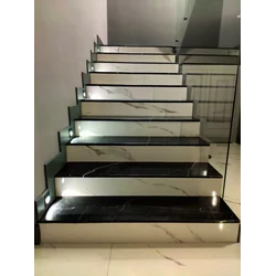 Black marble-like tiles for stairs with VEIN 100x30 high GLOSS