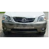 Mazda Tribute - Ajustarea barei de protecție false cromate