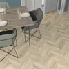 Vedenpitävät laminoidut lattiapaneelit CHIC CHEVRON FAUS pakkaus. 2,08 m2